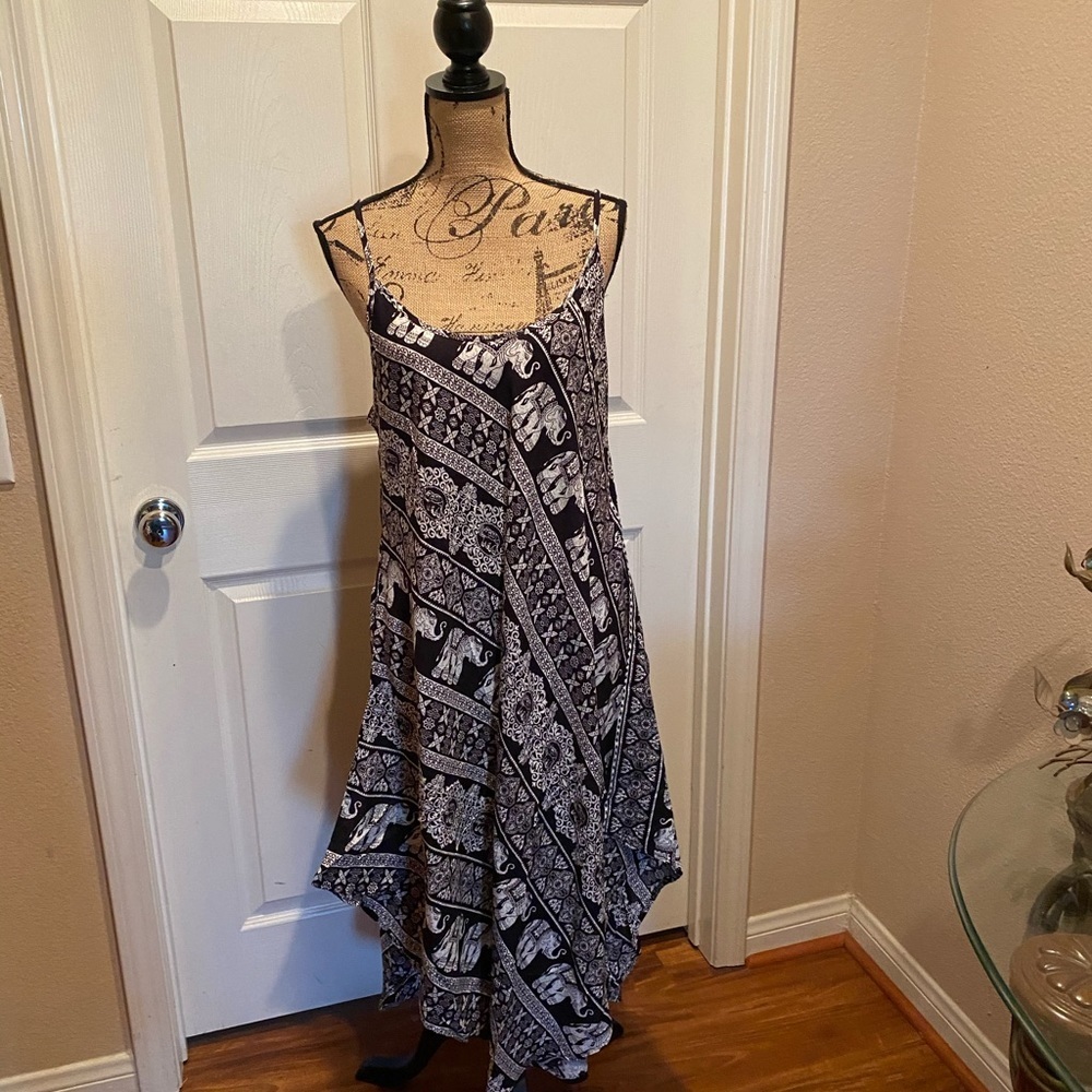 Black and white elephant print, thin strap dress.